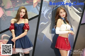 A woman in a blue and red dress posing for a picture.
