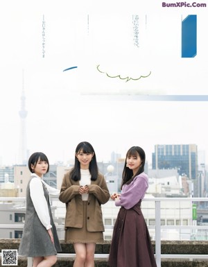A woman in a school uniform is posing for a magazine.