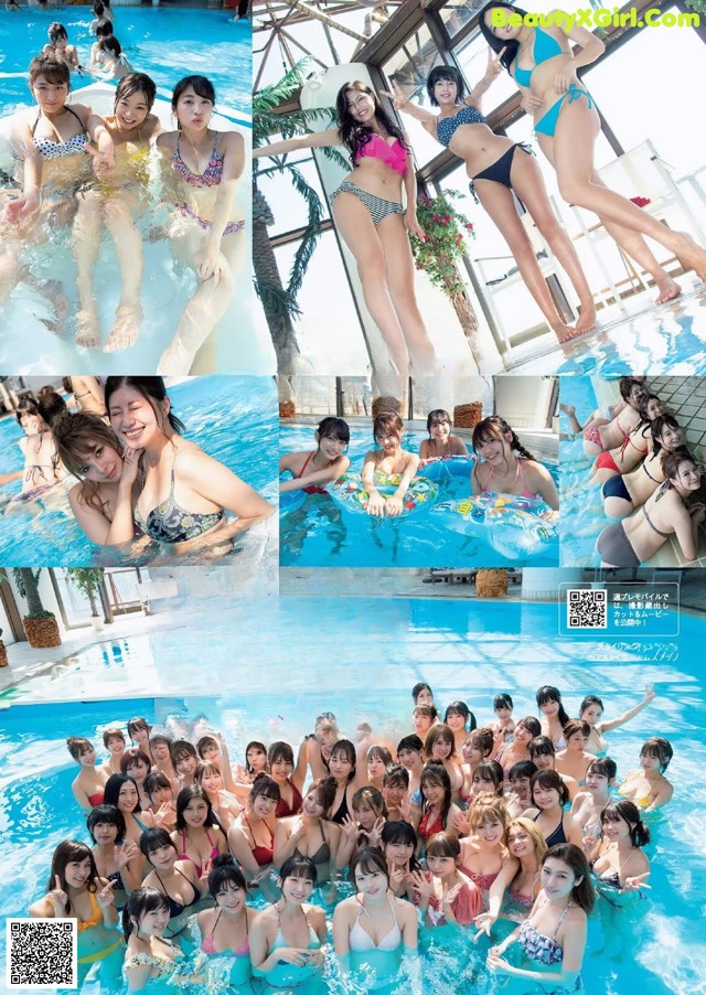 a group of women in bikinis posing for a photo in a pool